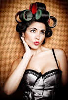 Image of woman with hair curlers