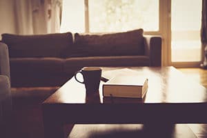 Couch with book and drink