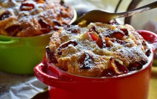 Plum cakes in casserole dishes
