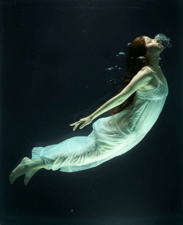 woman swimming underwater