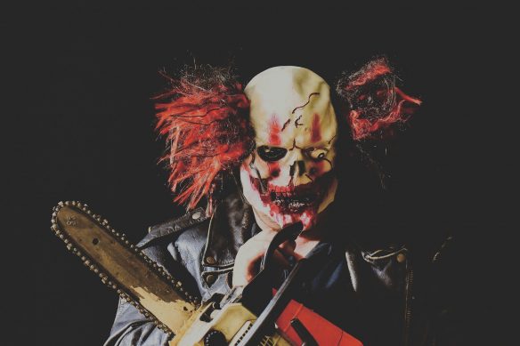 clown with chainsaw